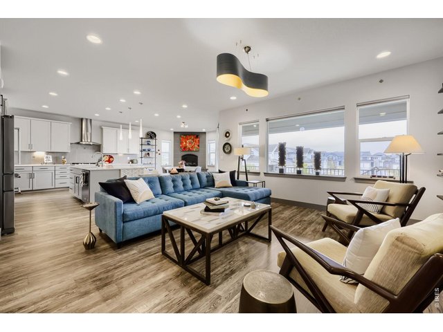 Property Photo 6 OPEN FLOOR PLAN WITH KITCHEN, GREAT ROOM, AND DINING AREA