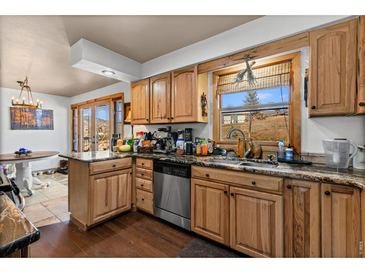 Granite, SS appliances, custom cabinetry, lazy susan corner cabinets and slide outs