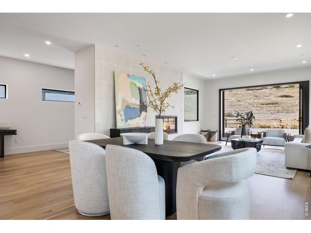 Property Photo 17 Plan your next dinner party in the dining area or gather around the living room's gas fireplace and stone-tile feature wall. 