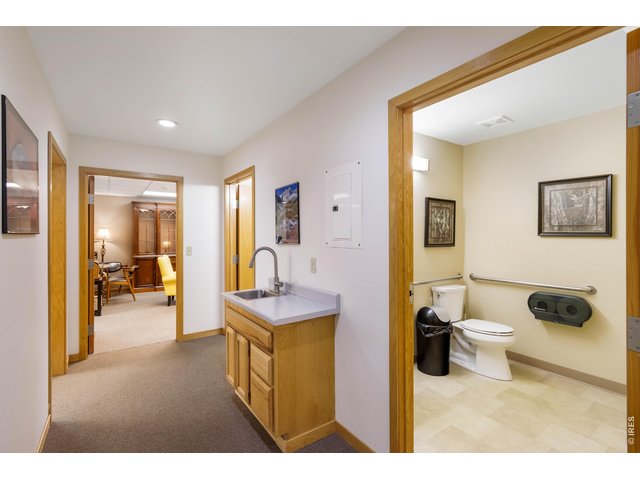 Property Photo 6 Hallway next to units with shared bathroom
