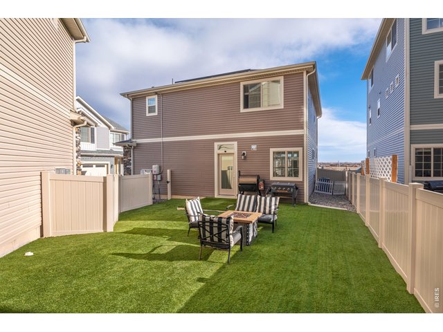 Property Photo 25 Fully fenced and turfed backyard