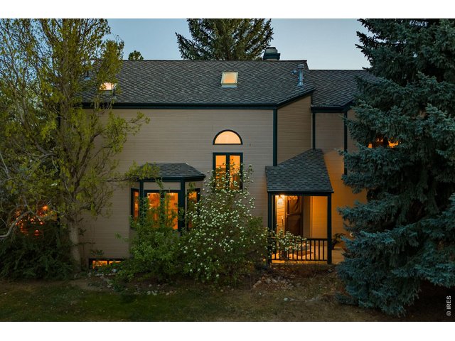 Property Photo 11 Nestled on a corner lot filled with mature trees, just steps from an expansive network of trails connecting all the way to Eldorado Canyon.