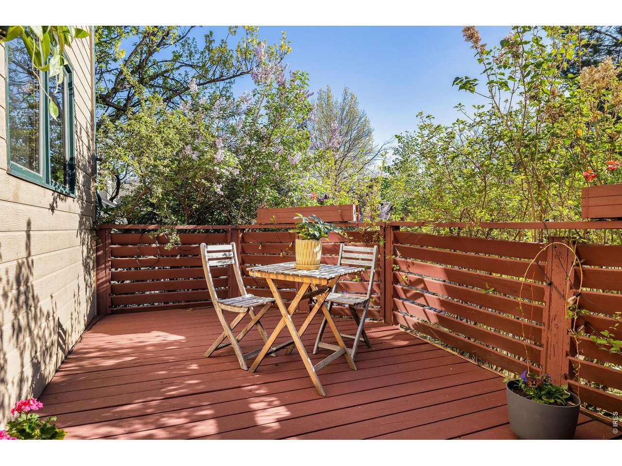 Enjoy slow mornings and quiet evenings from your private back porch. 