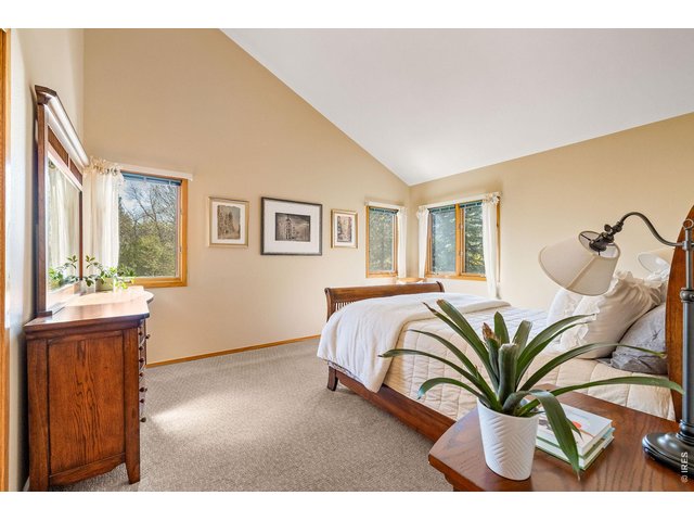 Property Photo 29 The sunlit, serene primary wing is complete with a king size bedroom, ensuite bathroom and oversized walk-in closet. 