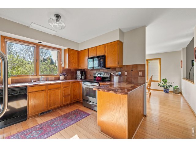 Property Photo 20 The open floor plan leads to a sunlit dining room/family room flex space. 