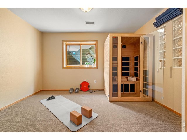 Property Photo 37 The fully finished basement features a private guest bedroom/workout space, a spacious rec room, media room, full bathroom and two storage spaces. 