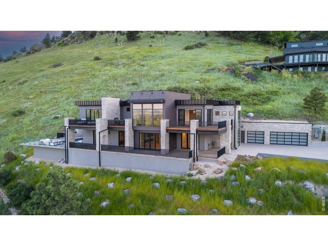 Property Photo 3 An extraordinary new construction residence overlooking the sweeping beauty of Boulder, this home offers 5,622 SF of impeccably designed living space.
