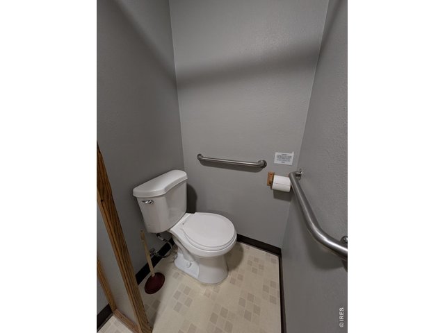 Property Photo 8 Left Half/ Bathroom