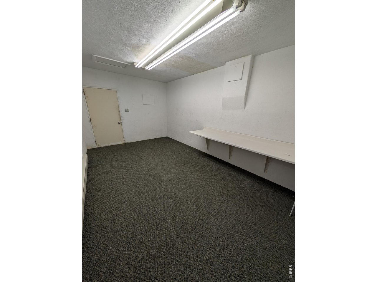Property Photo 4 Right half/Storage room/Back door