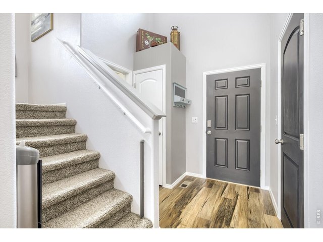Property Photo 4 Entry foyer with soaring ceilings