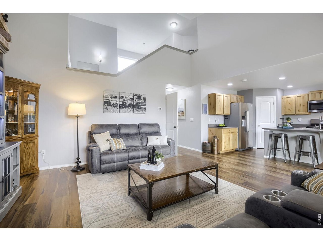 Living Room on main level with soaring ceilings