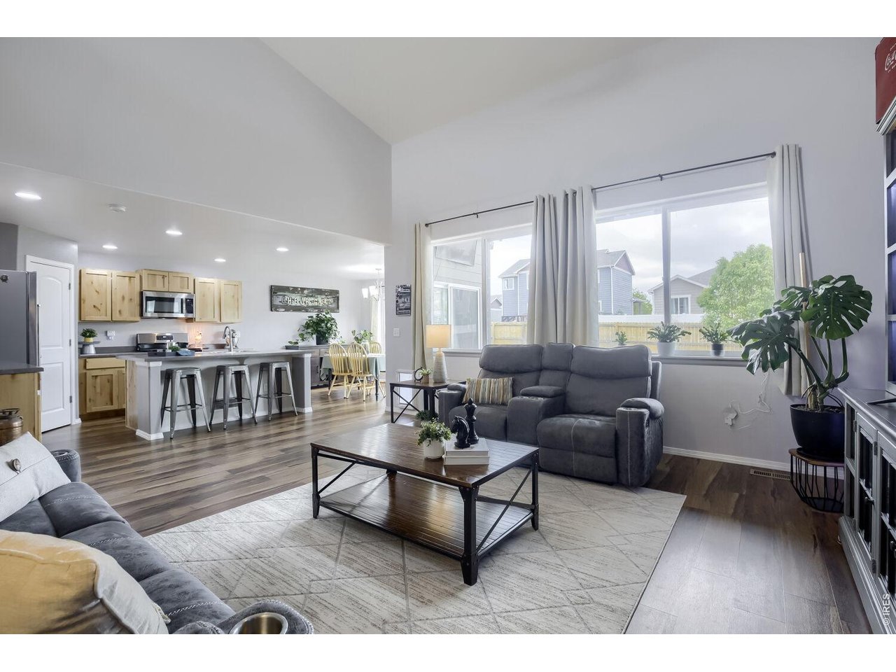 Living Room on main level with soaring ceilings