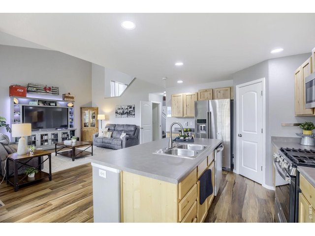 Property Photo 10 Kitchen with stainless appliances