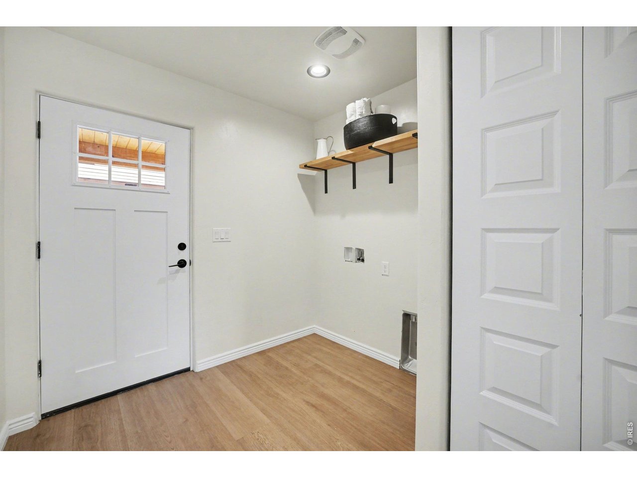 Property Photo 22 Laundry Room and Backdoor