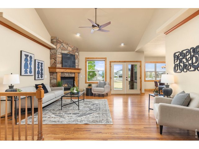Property Photo 8 Hardwood Floors, Soaring Ceilings and Wide Open Spaces Welcome You In