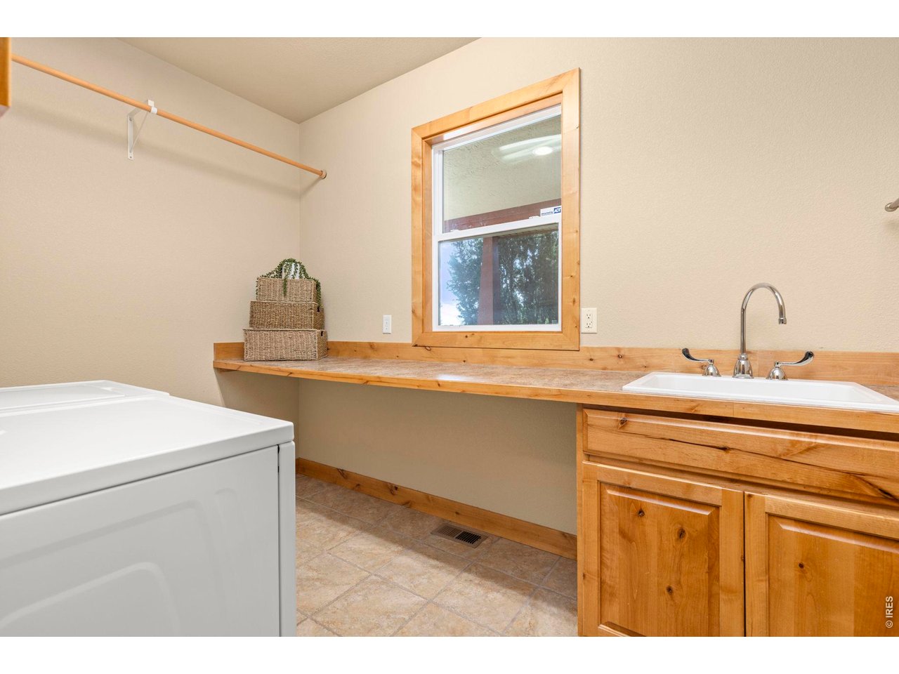 Large Laundry Room with Sink and Folding Counter
