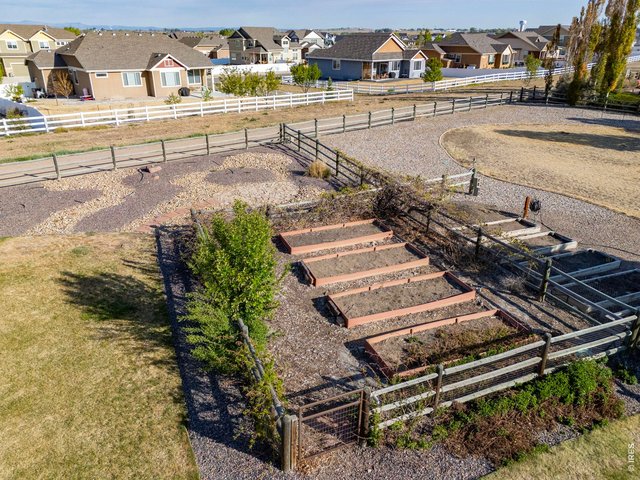 Property Photo 39 Fully Fenced and Irrigated Garden Area With Raspberries and Grapes and Room For More