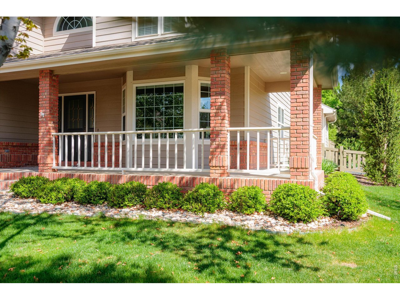 Charming wrap-around porch ideal for relaxing and entertaining