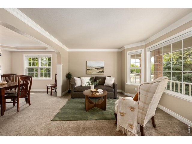 Property Photo 7 Where comfort meets style - detailed molding throughout adds character 