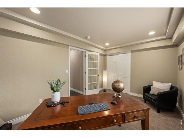 Property Photo 19 Sophisticated main floor office or private 5th bedroom with coffered ceilings