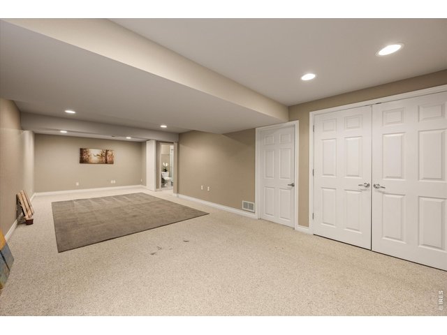 Property Photo 41 Versatile lower-level space - ideal for a 6th bedroom, theater or media room