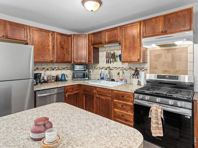 Property Photo 25 Complete with its own full kitchen with new refrigerator, range/oven and dishwasher