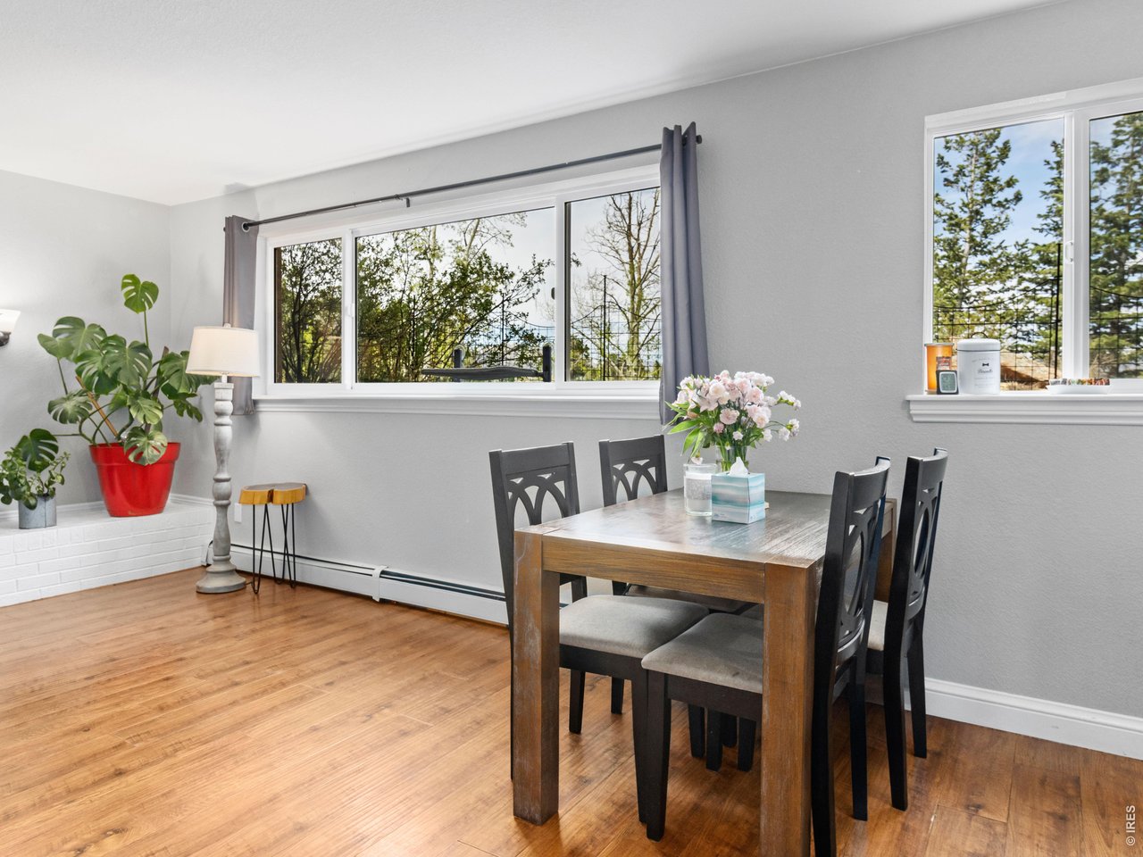 Spacious living and dining area with fireplace