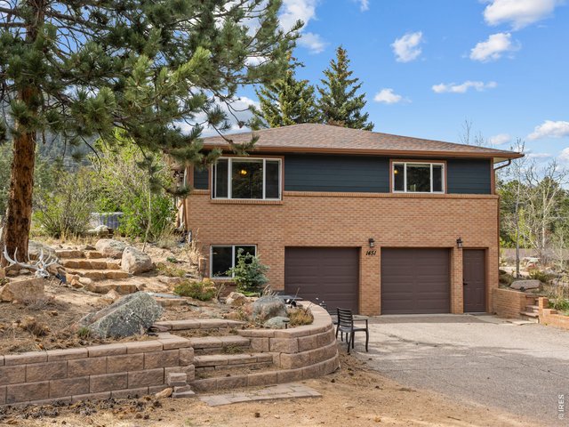 Property Photo 34 Attached 2 car garage offers separate entrance to the lower level living