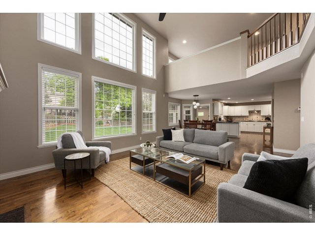 Property Photo 11 Stunning family room with soaring ceilings and expansive windows 
