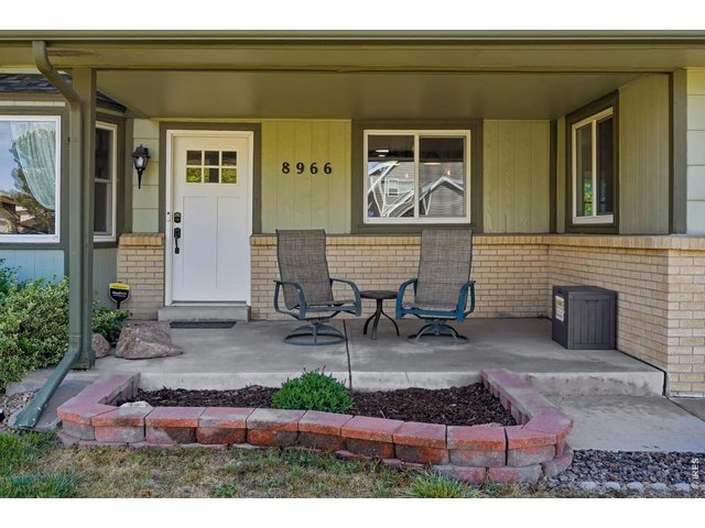 Property Photo 3 Spacious front porch with stunning mountain views