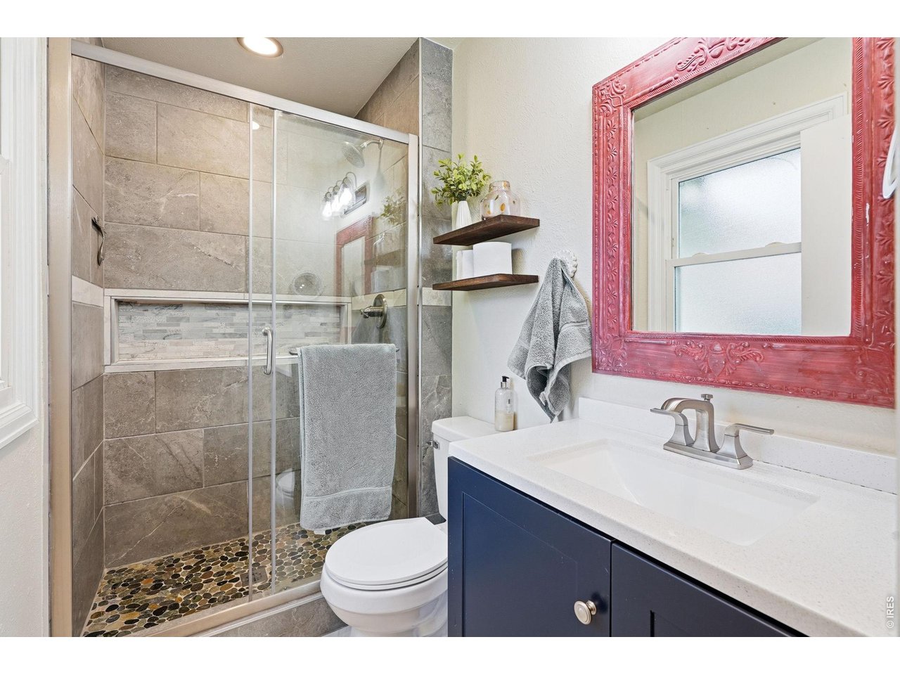 Primary suite with a beautifully remodeled bathroom