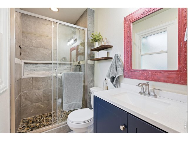 Property Photo 19 Primary suite with a beautifully remodeled bathroom