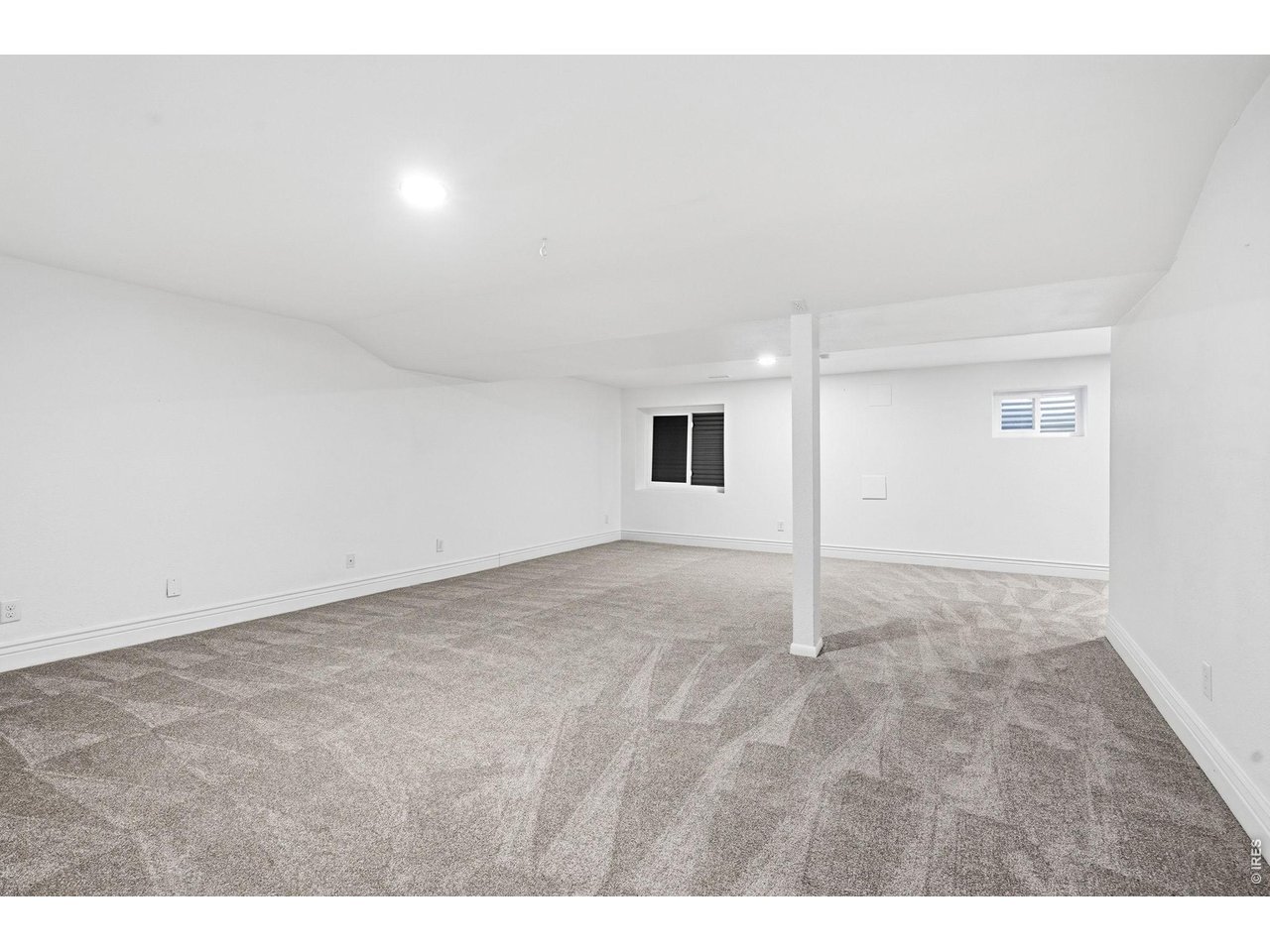 Expansive basement provides additional living space with new carpet, a large recreation room, laundry room (washer and dryer included), an additional bedroom, and two bathrooms 