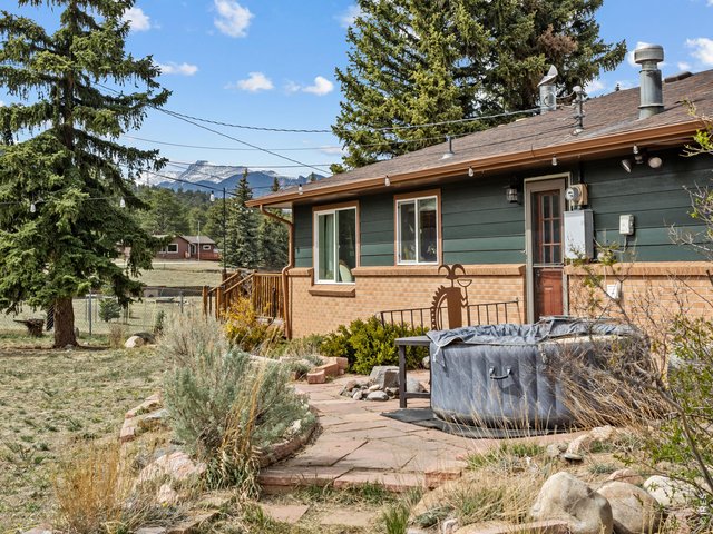 Property Photo 32 Back patio, stunning mountain views!