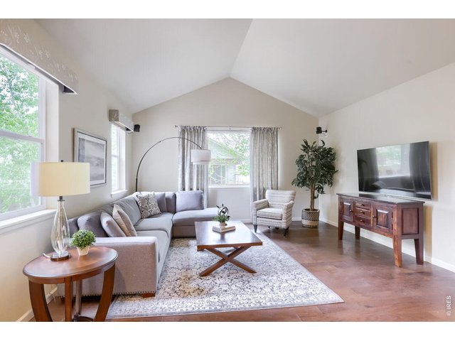 Property Photo 9 Family room with vaulted ceiling