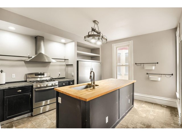 Property Photo 8 Kitchen One