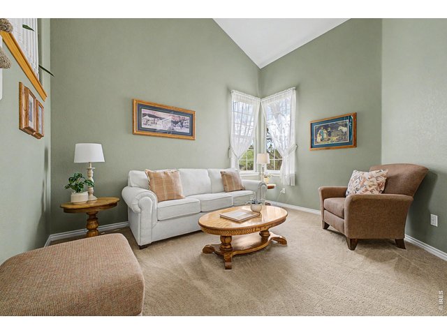 Property Photo 12 Sitting room adjacent to entryway 
