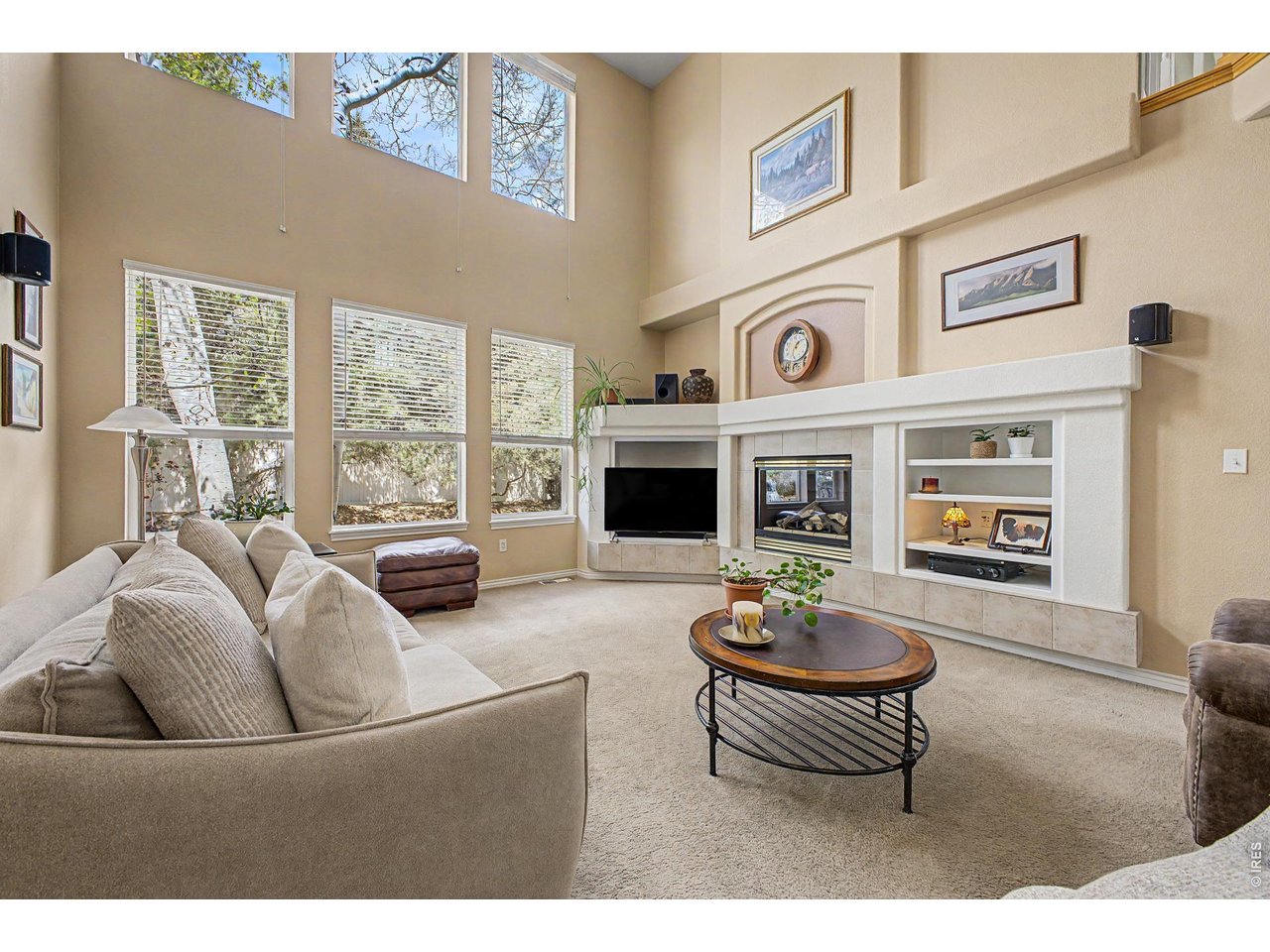 Living Room with Huge Windows and Vaulted Ceilings 