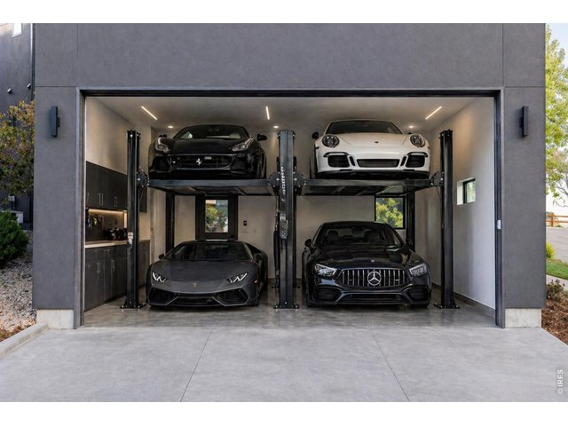 Property Photo 45 Ai rendering of car lift in garage. 