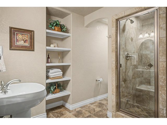 Property Photo 31 Lower Level 3/4 bath w/ Steam Shower