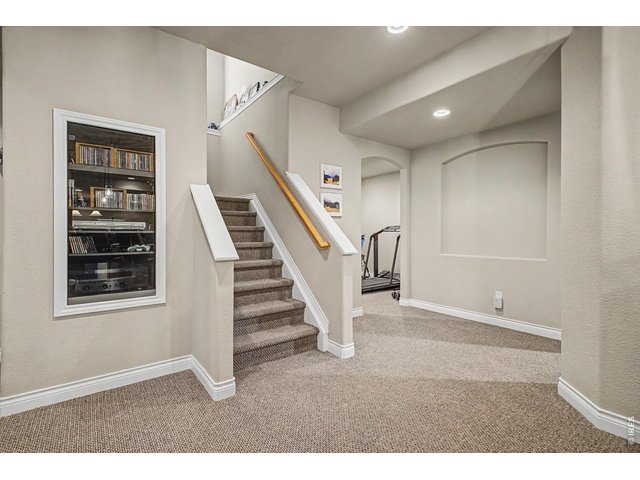 Property Photo 25 Stairs to Lower Level 