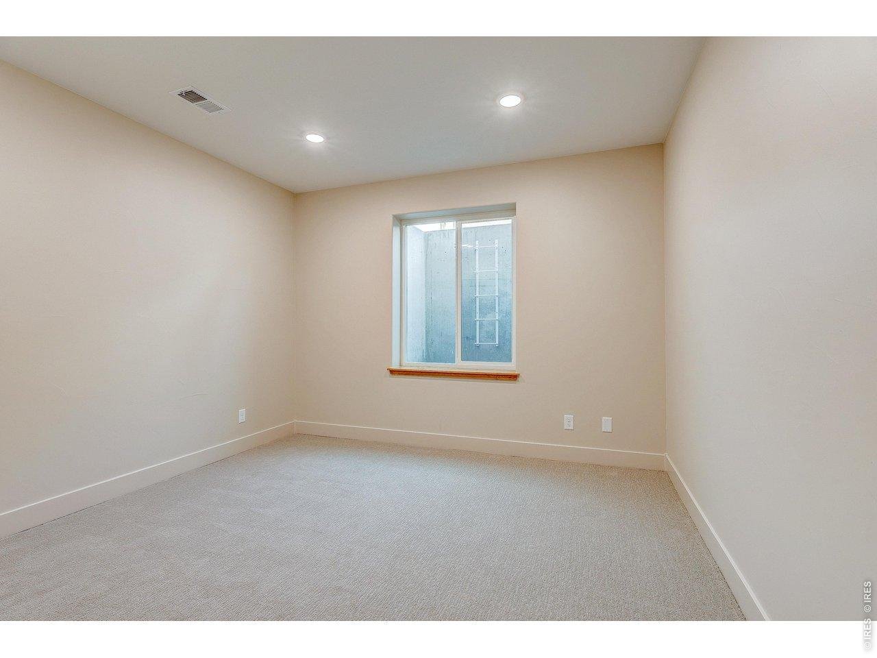 Property Photo 43 Bedroom 4- Basement