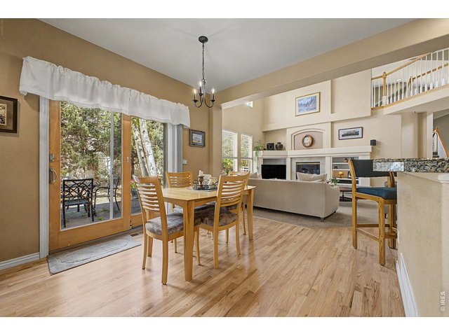 Property Photo 8 Eat in Kitchen blends into bright living room 