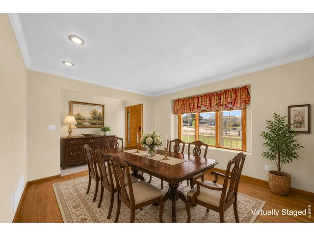 Property Photo 5 Formal Dining room Virtually Staged