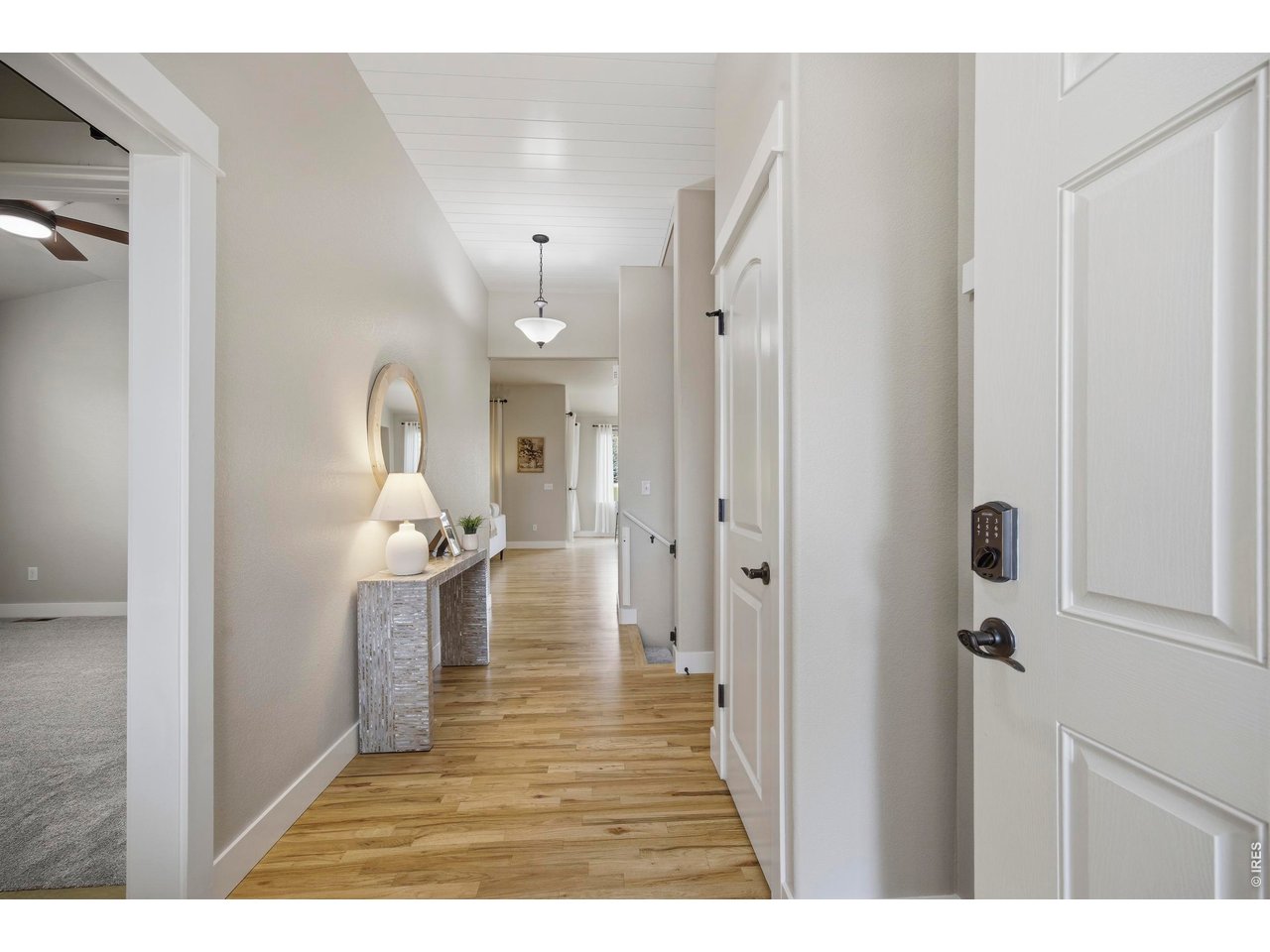 Entryway with Shiplap on Tall Ceilings, Coat Rack and Coat Closet