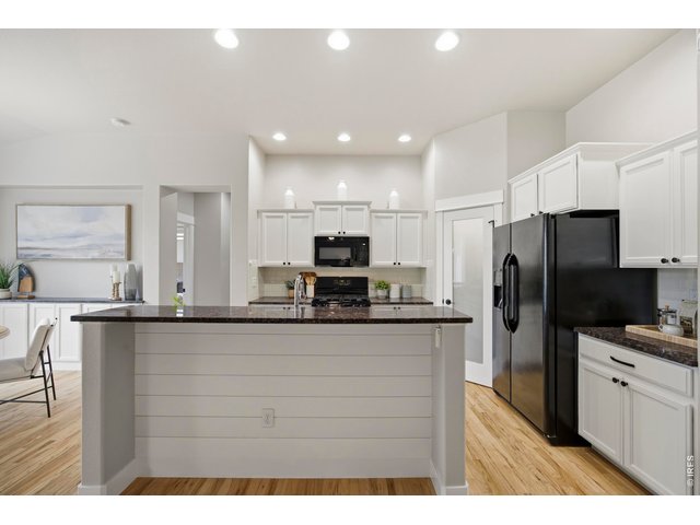 Property Photo 8 Large Walk-In Pantry, Shiplap Accent on Bar, All Appliances included