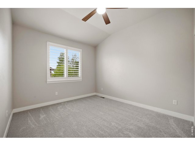 Property Photo 19 Bedroom 3 on Main Level with Custom Shutters and Ceiling Fan