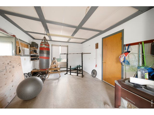 Property Photo 16 Garage Workspace (heater/stove not included)