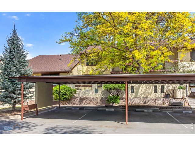 Property Photo 38 One Covered Assigned Carport to the left of center pole