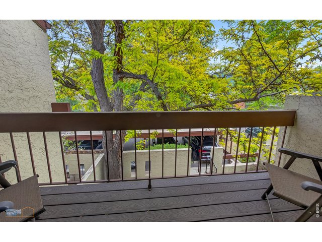 Property Photo 30 Balcony off South Facing East side Bedroom. No picture of bedroom 2 with a walk in closet